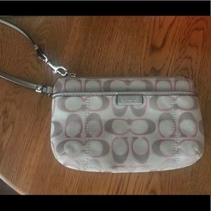 Pink and tan shimmer Coach wristlet